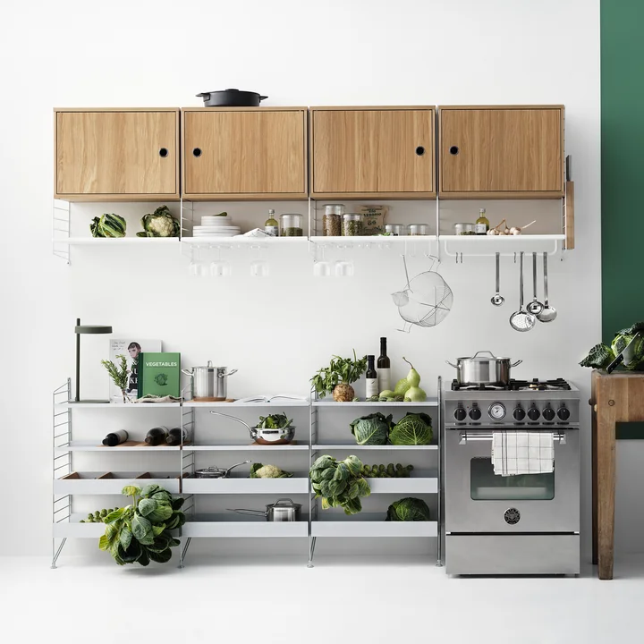 The Pocket wall shelf from String as a kitchen reality