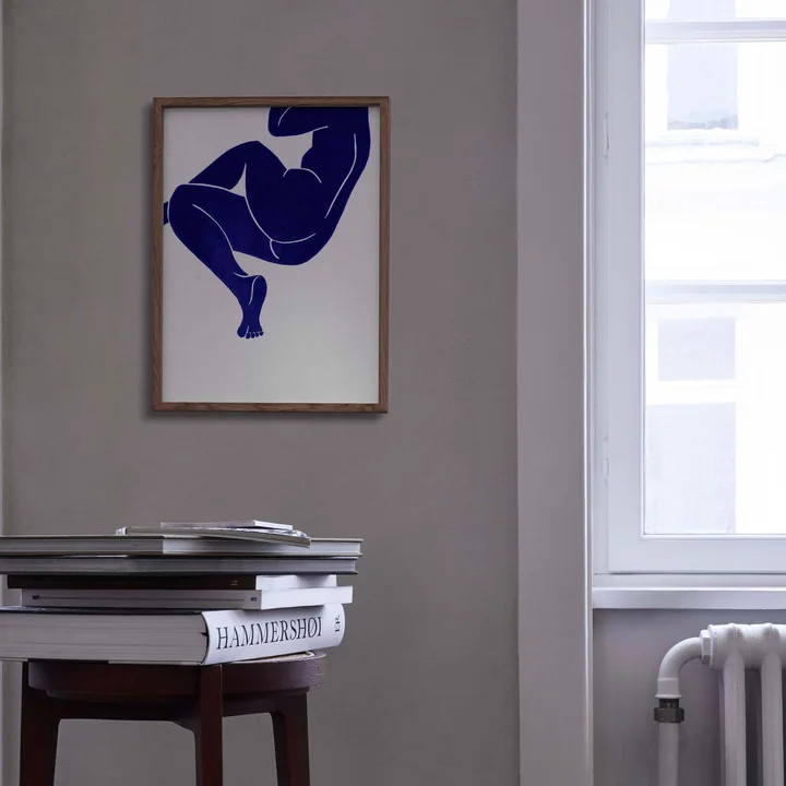 The Linocut poster from Paper Collective with vivid blue figure