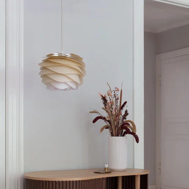The Carmina lampshade from Umage above the sideboard