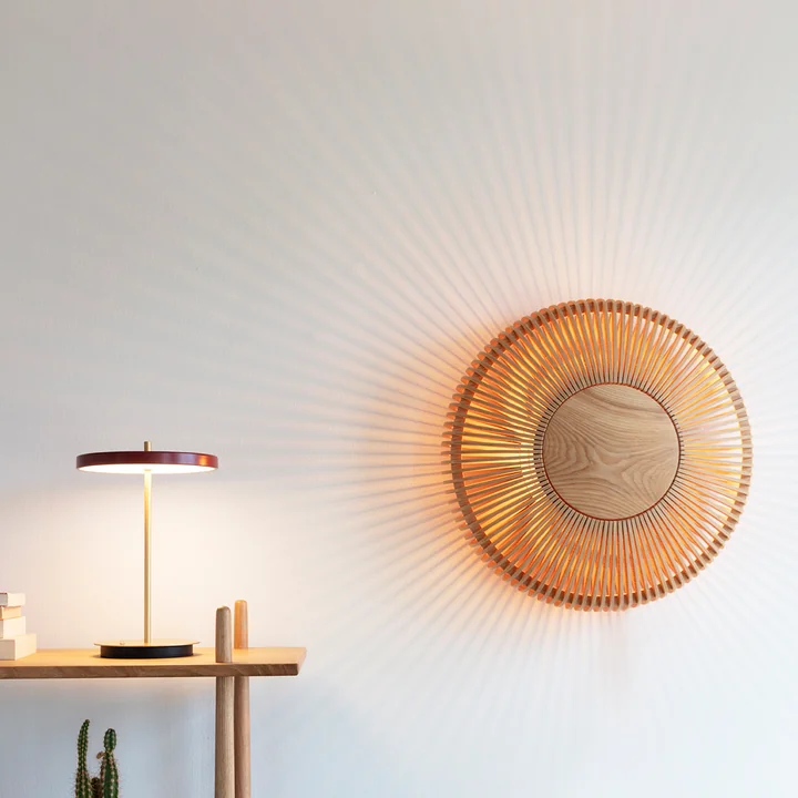 The Clava Up Wood lampshade from Umage shines like the sun