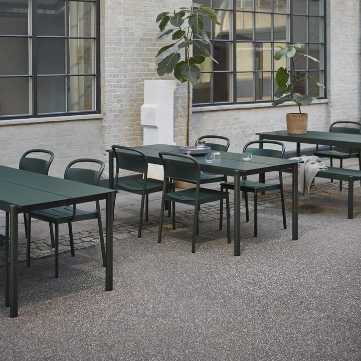 The Linear Steel table and side chair from Muuto on a public terrace
