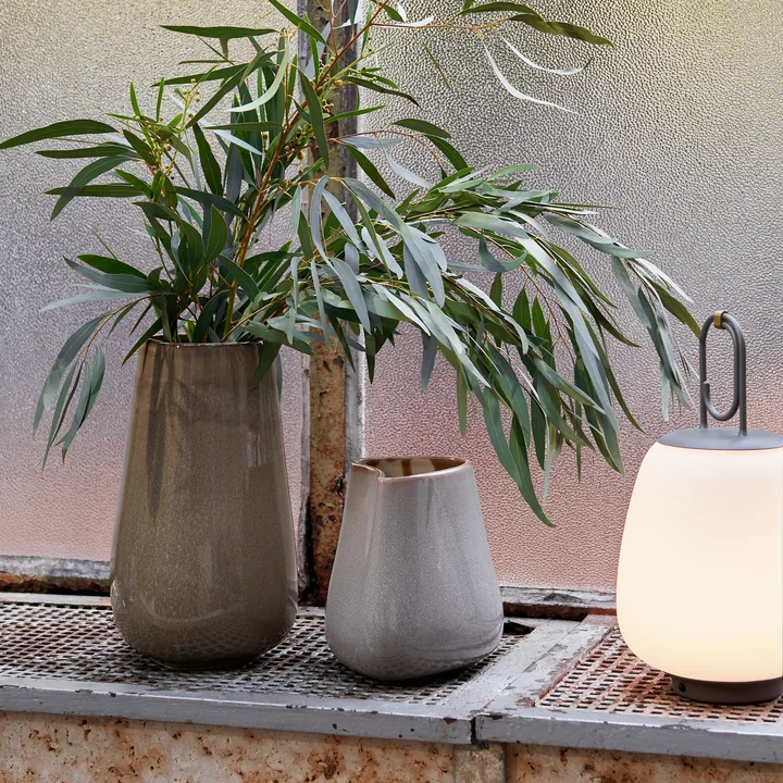 The Collect ceramic vases from & Tradition with a green bush