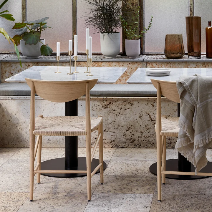 A restaurant furnished with furniture and accessories from & Tradition