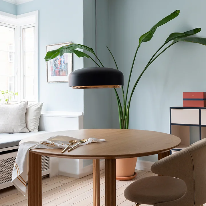 The Hazel LED pendant light from Umage above the dining table