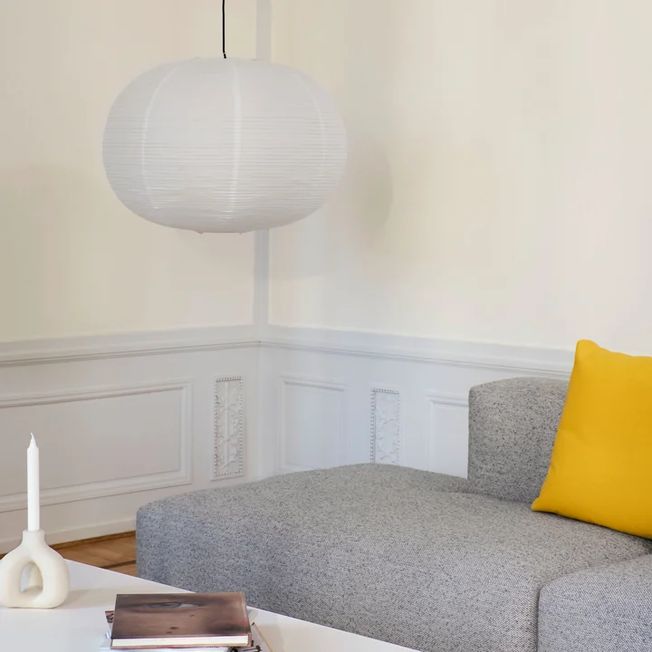 The Rice Paper lampshade from HAY as a pendant lamp above the sofa
