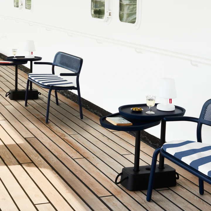 The Toní bench with the Brick side table from Fatboy on a ship deck