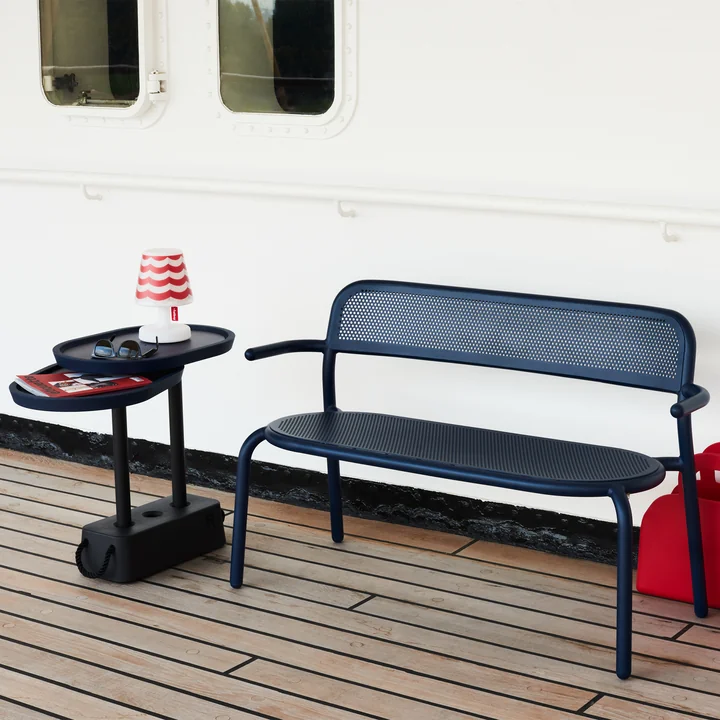 The Brick side table next to the Toní bench by Fatboy