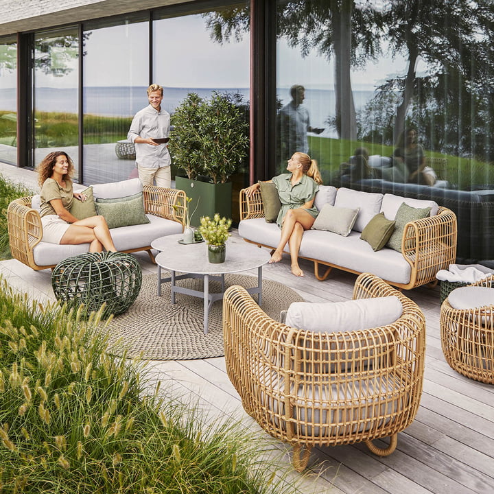 The soft, round Nest Outdoor furniture from Cane-line on the terrace