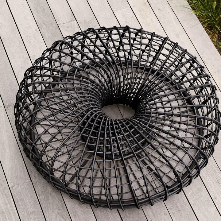 The Nest stool / side table Outdoor from Cane-line is simple, comfortable and of high quality.