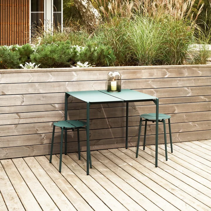 The Novo stool from AYTM on the wooden terrace