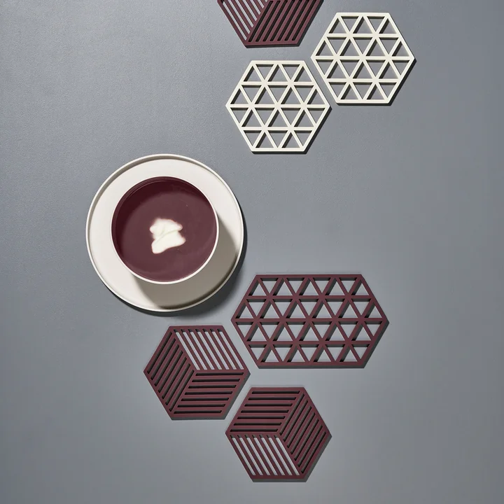 The Hexagon and Triangle coasters from Zone Denmark in beetroot red