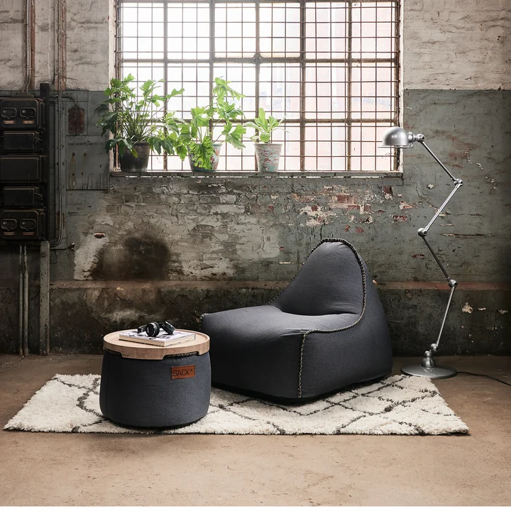 The RETRO it Canvas pouf and beanbag from SACK it in an industrial ambience