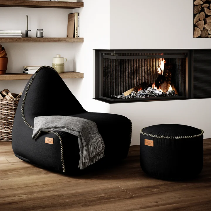 The RETRO it Canvas Pouf Indoor and the beanbag from SACK it by the fireplace