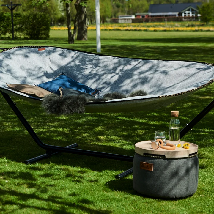 The RETRO it Cobana Drum Outdoor Pouf from SACK it as a side table