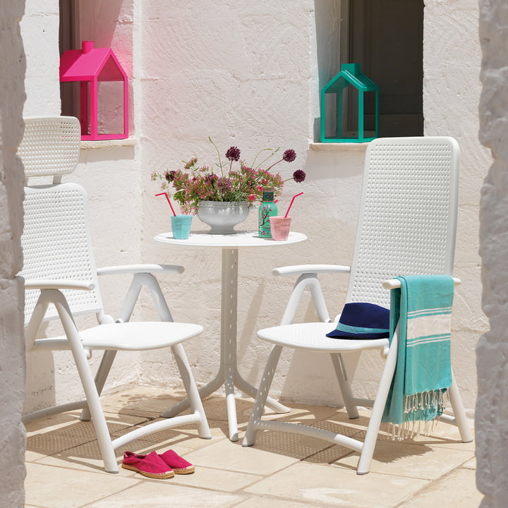 The Acquamarina Relax Garden chair and the Darsena Relax Folding chair from Nardi on the summer stone terrace