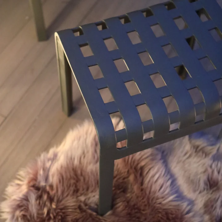 The Poggio stool from Nardi can serve as a footstool or a seat