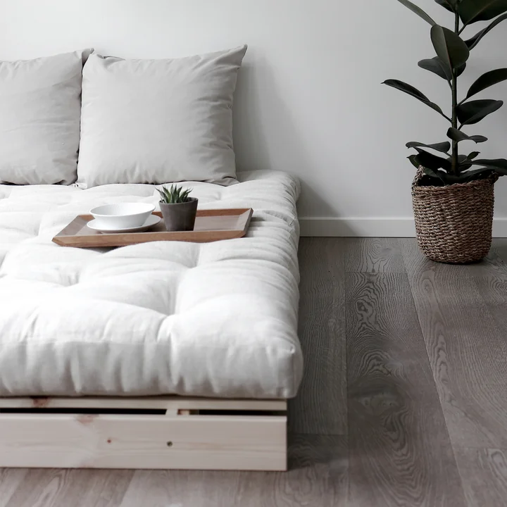 The Roots sofa bed from Karup Design radiates naturalness in the bedroom