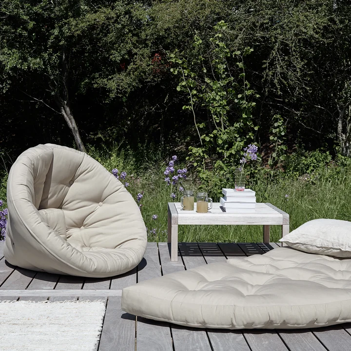 The Nido OUT futon chair from Karup Design as a nest on the terrace