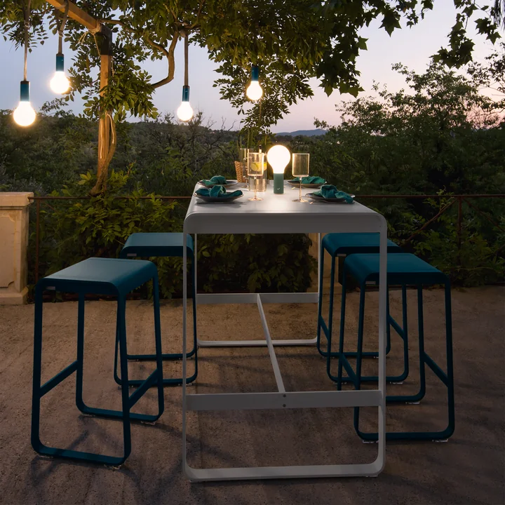 The Aplo outdoor lights from Fermob at dusk