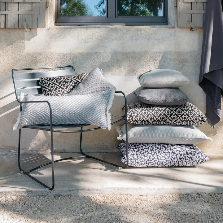 The outdoor cushions on the Surprising Lounger armchair from Fermob