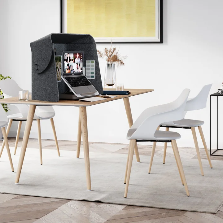 The Fold-Up Workspace room divider from Wilkhahn on the dining table