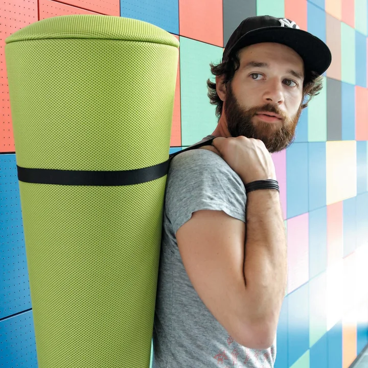 The Stand-Up stool from Wilkhahn with loop for transportation