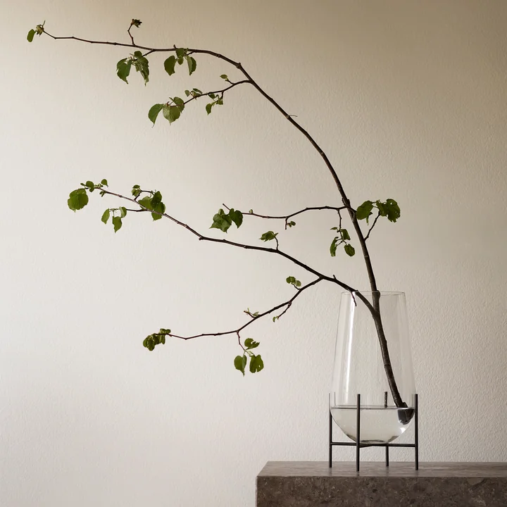 The clear Echasse vase from Audo with large branches