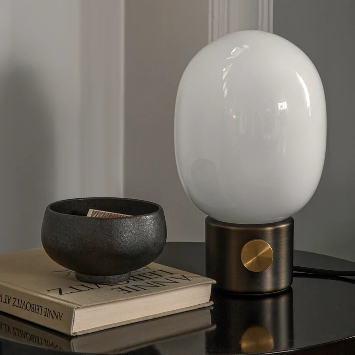 The JWDA table lamp from Audo with brass base