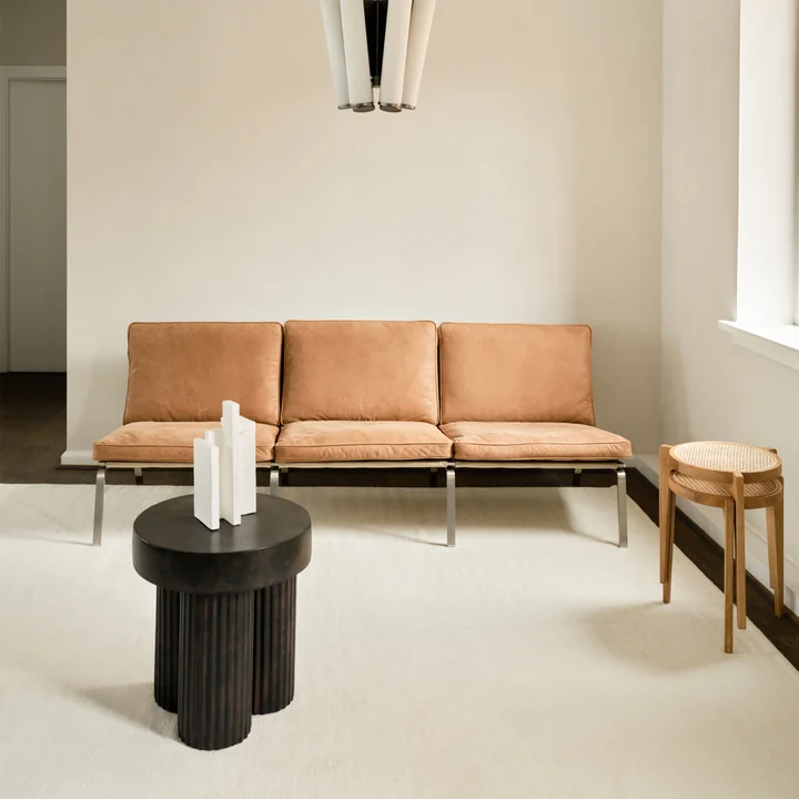 The Gear side table from Norr11 is painted by hand