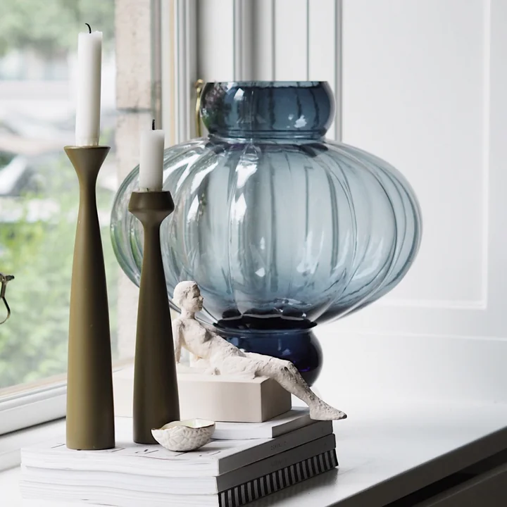 The Blossom Candle holder from applicata on the windowsill
