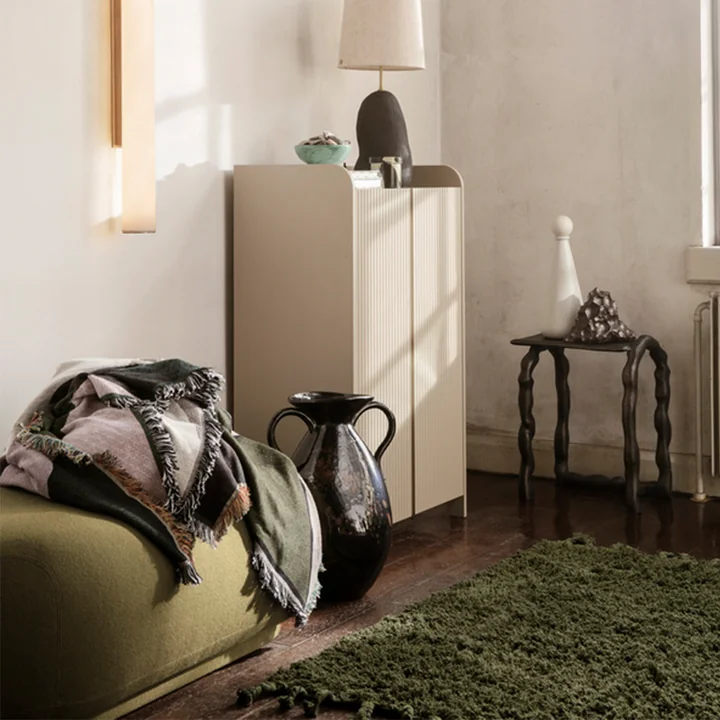 Amass high pile carpet from Ferm Living in olive