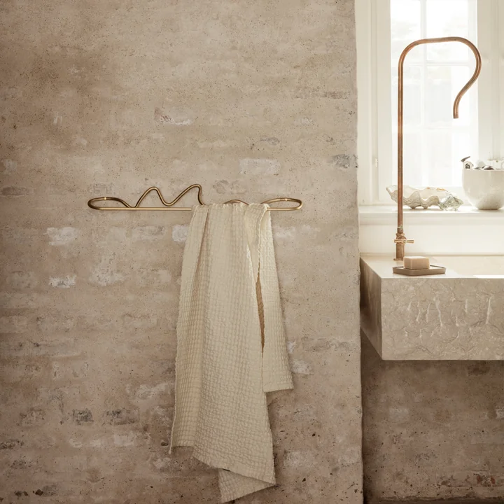 Curvature towel rail and Organic bath towel from Ferm Living