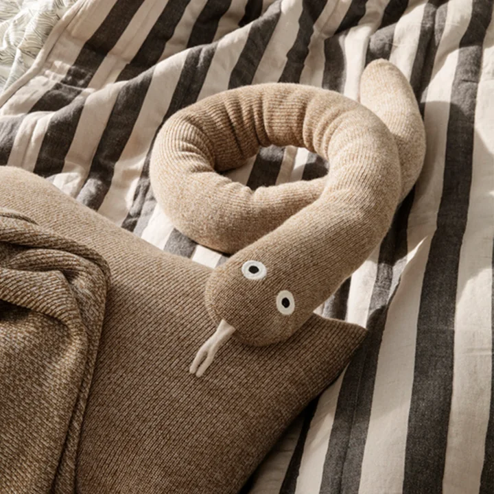Grand blanket and Mr. Snake pillow from Ferm Living
