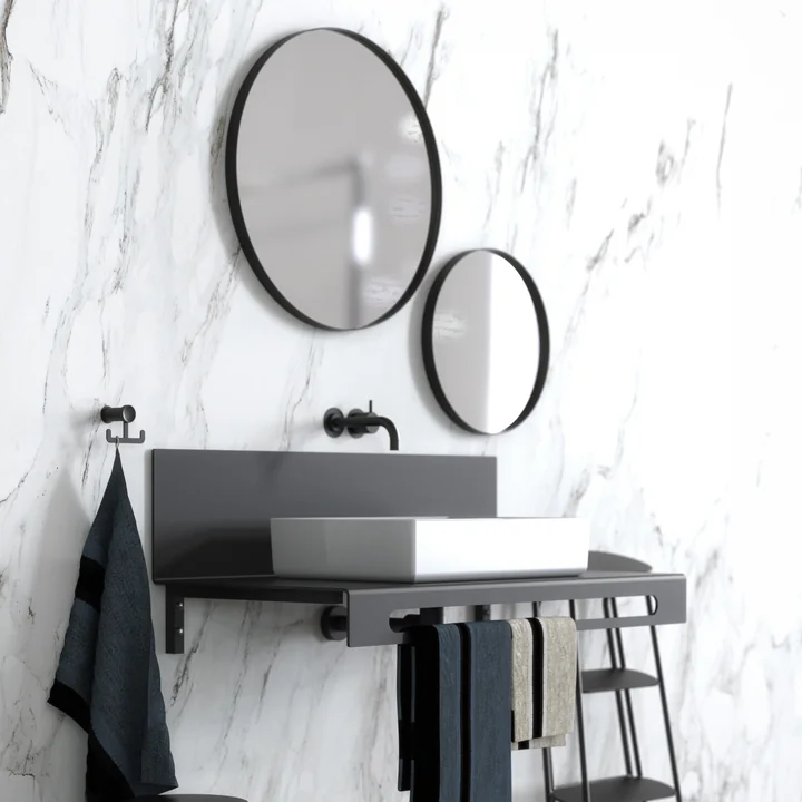 The round Unu wall mirrors from Frost in combination in the bathroom
