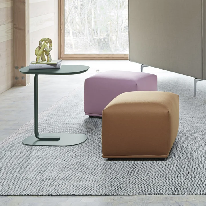 Relate Side Table, H 60.5 cm in dark green and Echo Pouf from Muuto