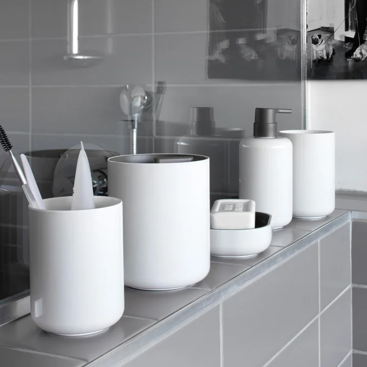 The Lunar lidded jars from Authentics on the shelf in the bathroom