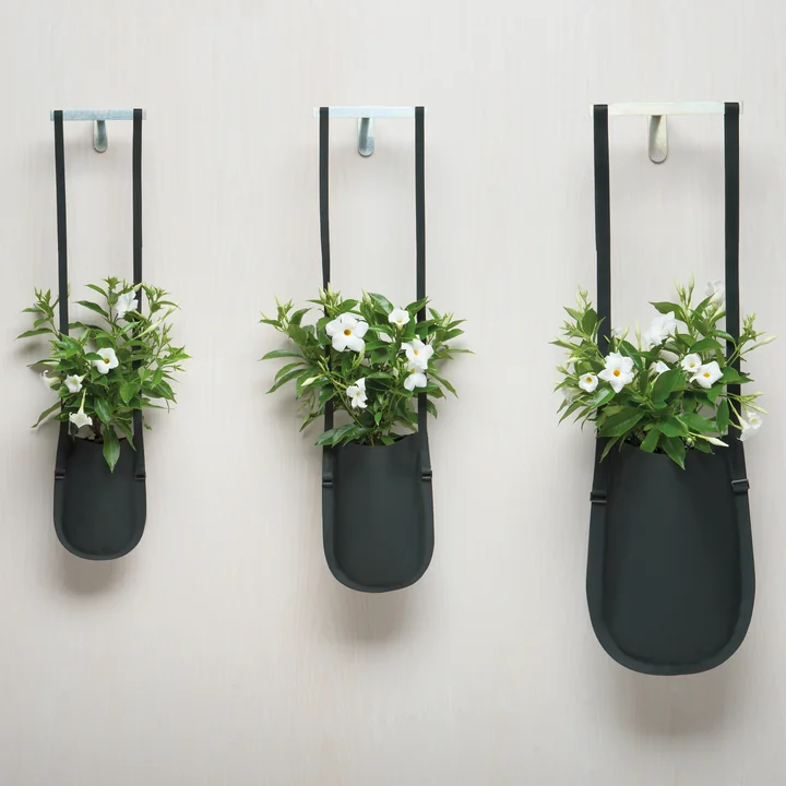 The Urban Garden planting bags from Authentics in different sizes on the wall mounting