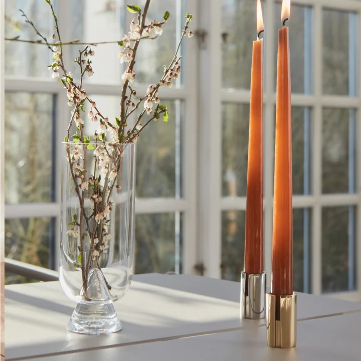 The Sol candle holder from AYTM casts beautiful reflections