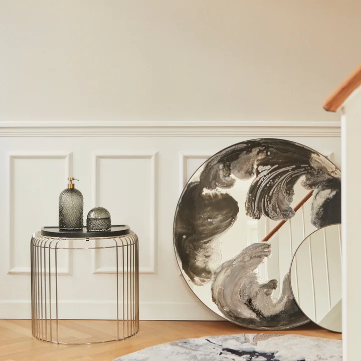 The Arura soap dispenser and the storage of AYTM on a side table