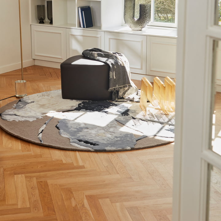 The Floreo carpet & Plaid with the Stilla Pouf by AYTM