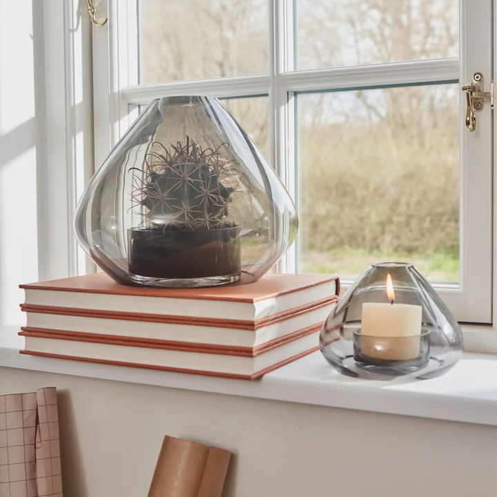 The Uno lantern and vase from AYTM on a windowsill