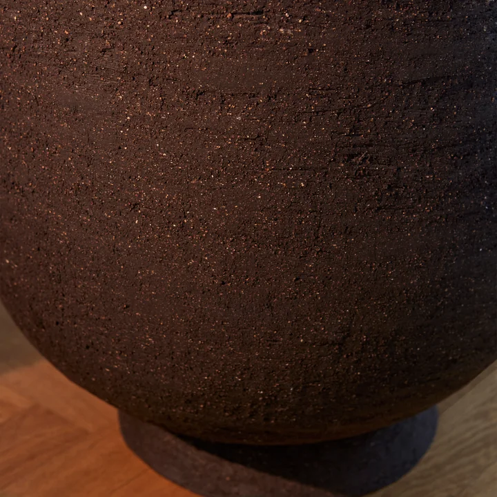 The Terra plant pot and vase from AYTM with rough clay surface