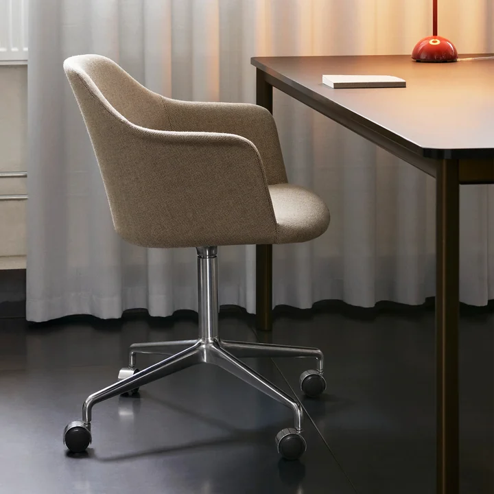 Timeless upholstered chair with castors