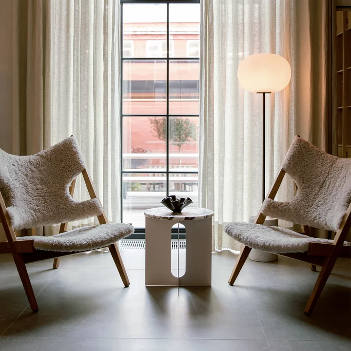 Stylish lounge chair in sheepskin look