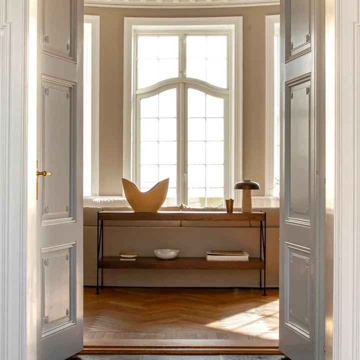 Minimalist shelving system made of wood and steel