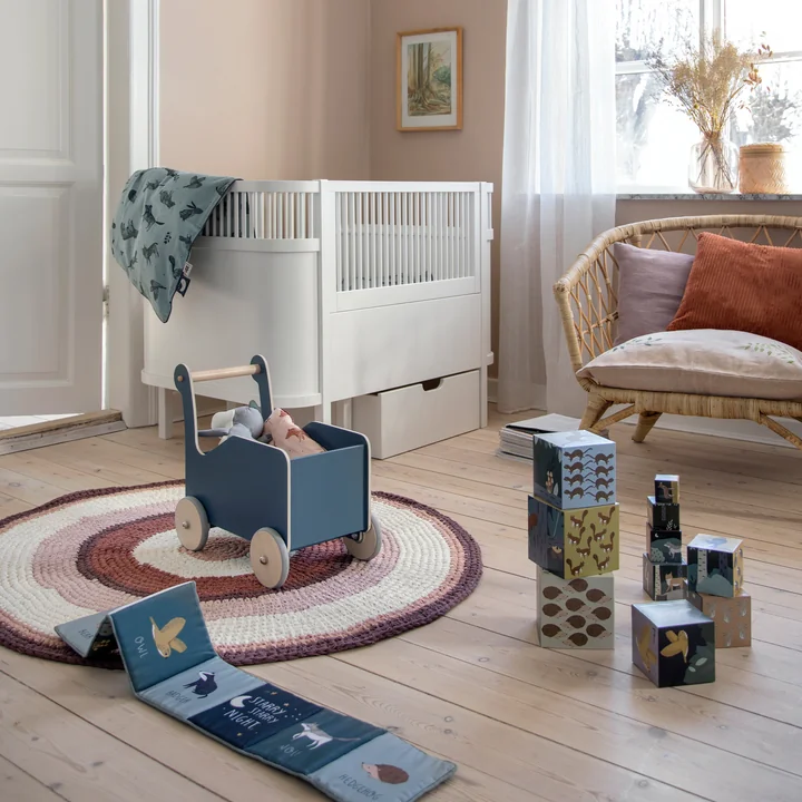 Baby walker and crochet rug from Sebra