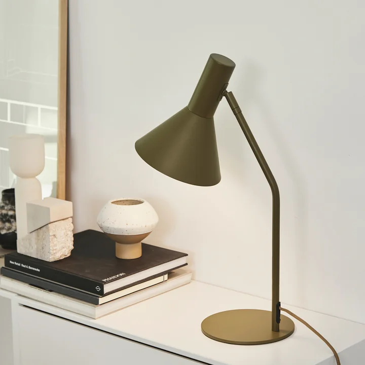Stylish table lamp on the sideboard