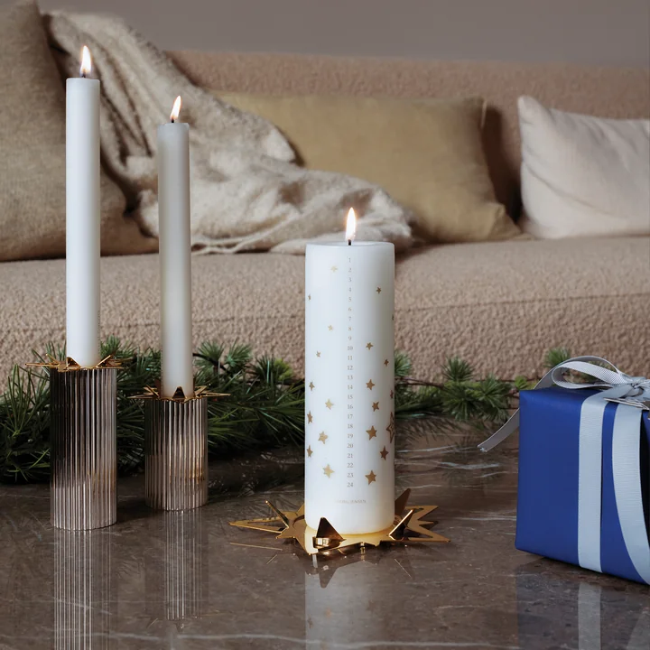 Bernadotte candle holder and Christmas Collectibles Calendar candle from Georg Jensen
