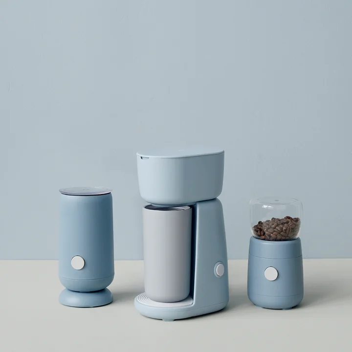 Milk frother, coffee maker and coffee grinder from Rig-Tig by Stelton in ambience view, light blue.
