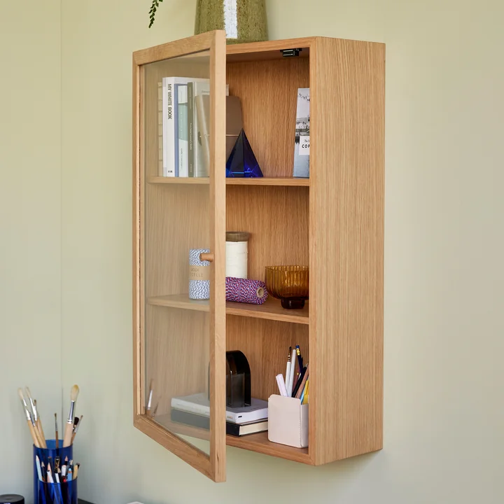 Oak cabinet with glass door in living room
